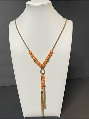 Gold-Tone Necklace with Pastel Orange Bead Accents and Tassel